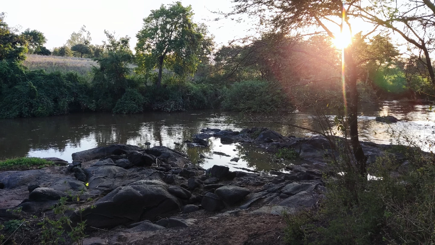 Sunset river view at Thiba River Camp